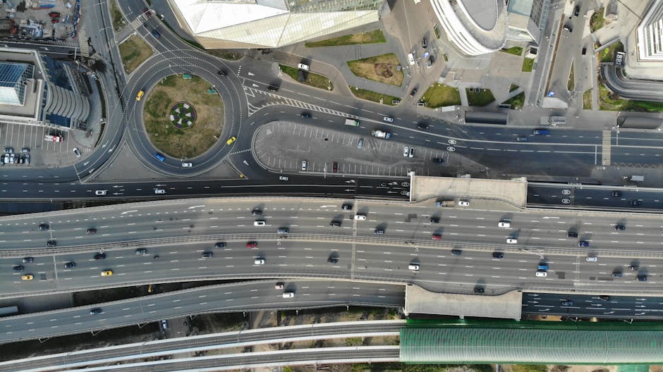 Aerial shot of major highway intersection in Moscow, showcasing traffic flow and urban structure.